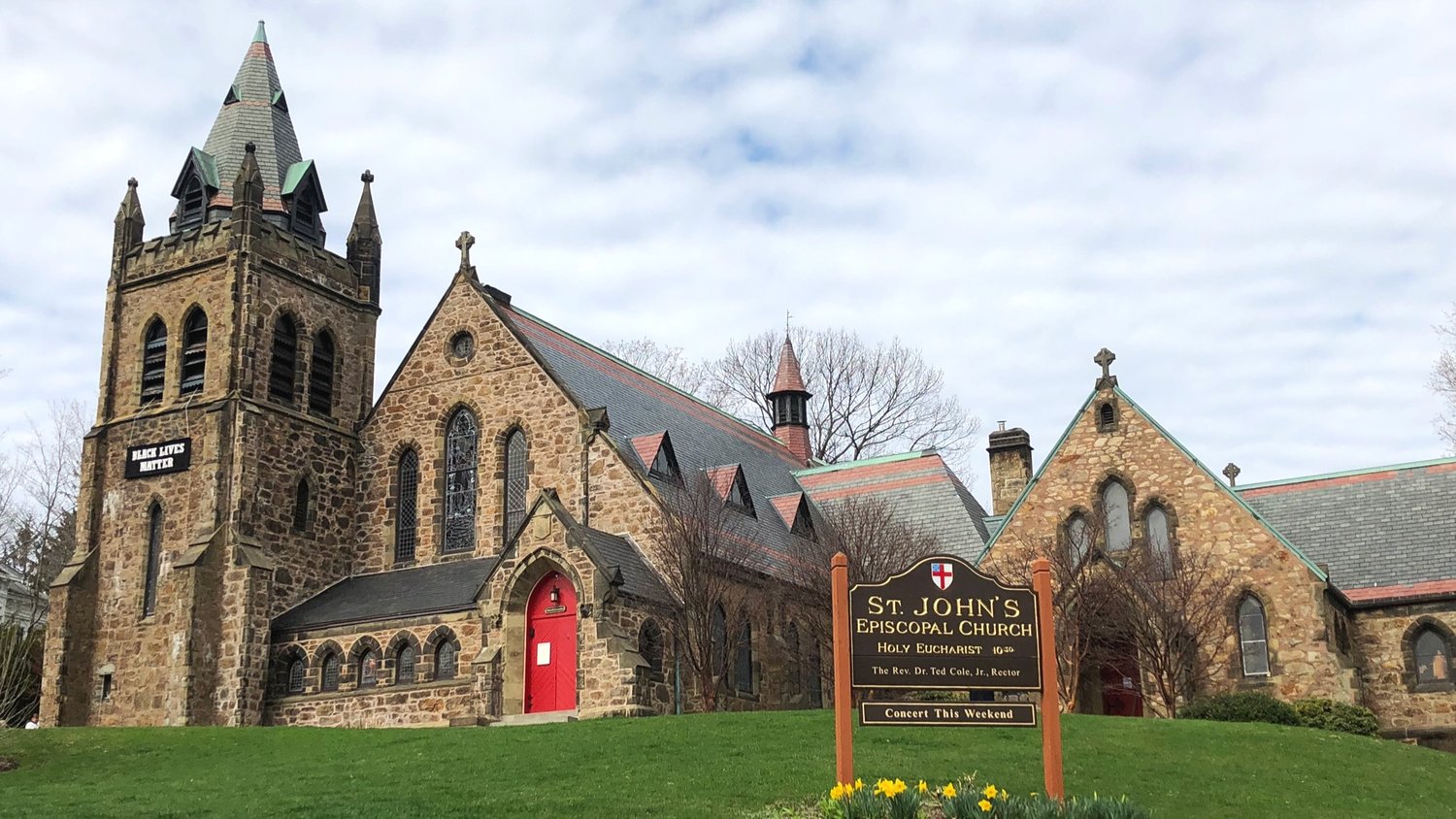 large old stone church on a hill